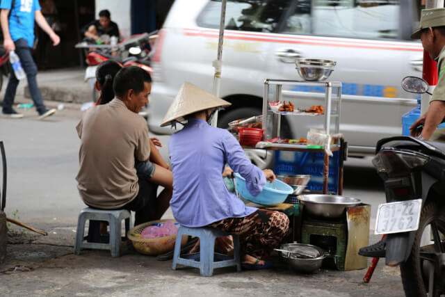 A women selling street food in Ho Chi Minh City