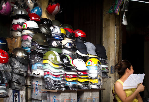 Women selling helmets in Vietnam